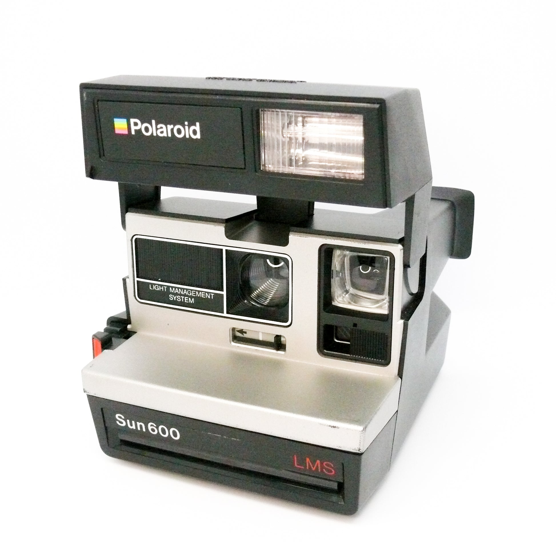 Polaroid Sun 600 LMS Instant Camera with original strap black and silver